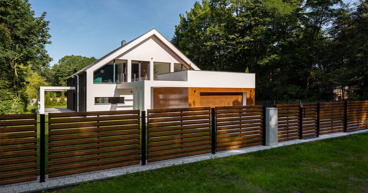 home with wooden fence