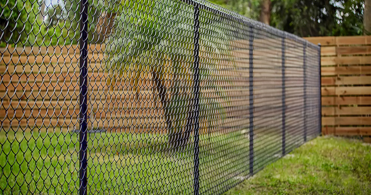 Chain link fence with dark metal posts