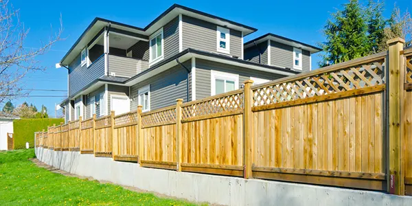 Lattice fence with big house