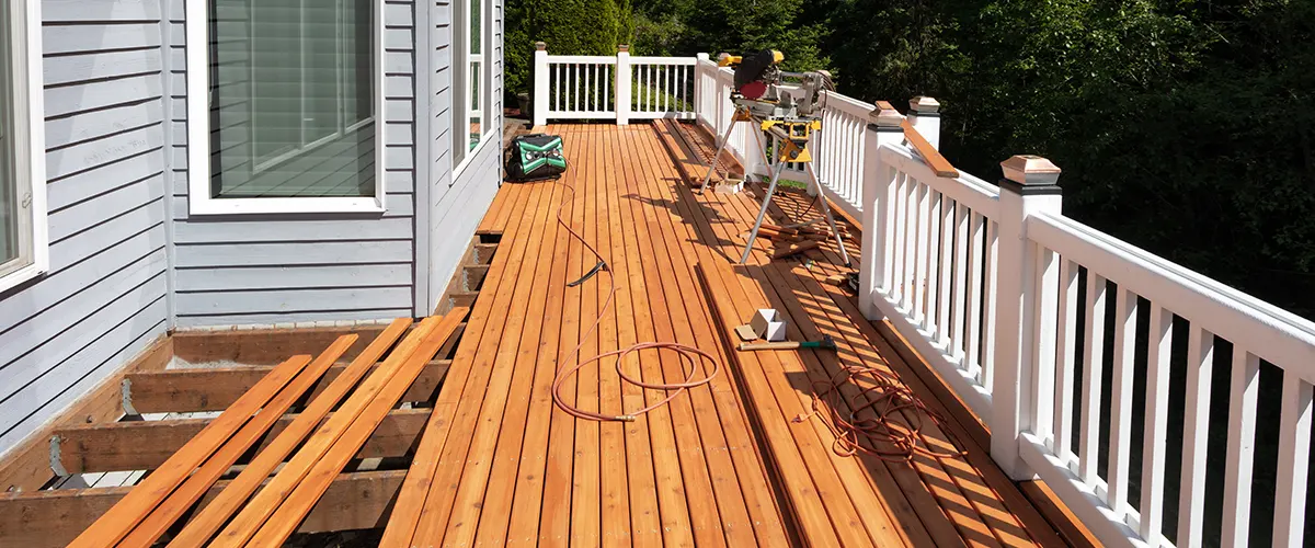 wooden deck boards and tools