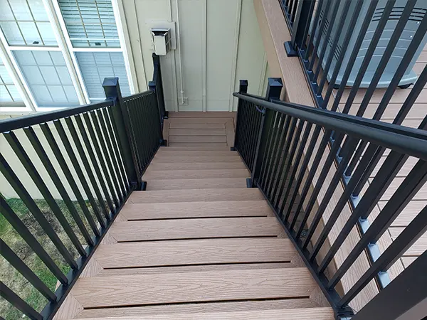 Aluminum railings on composite decking stairs